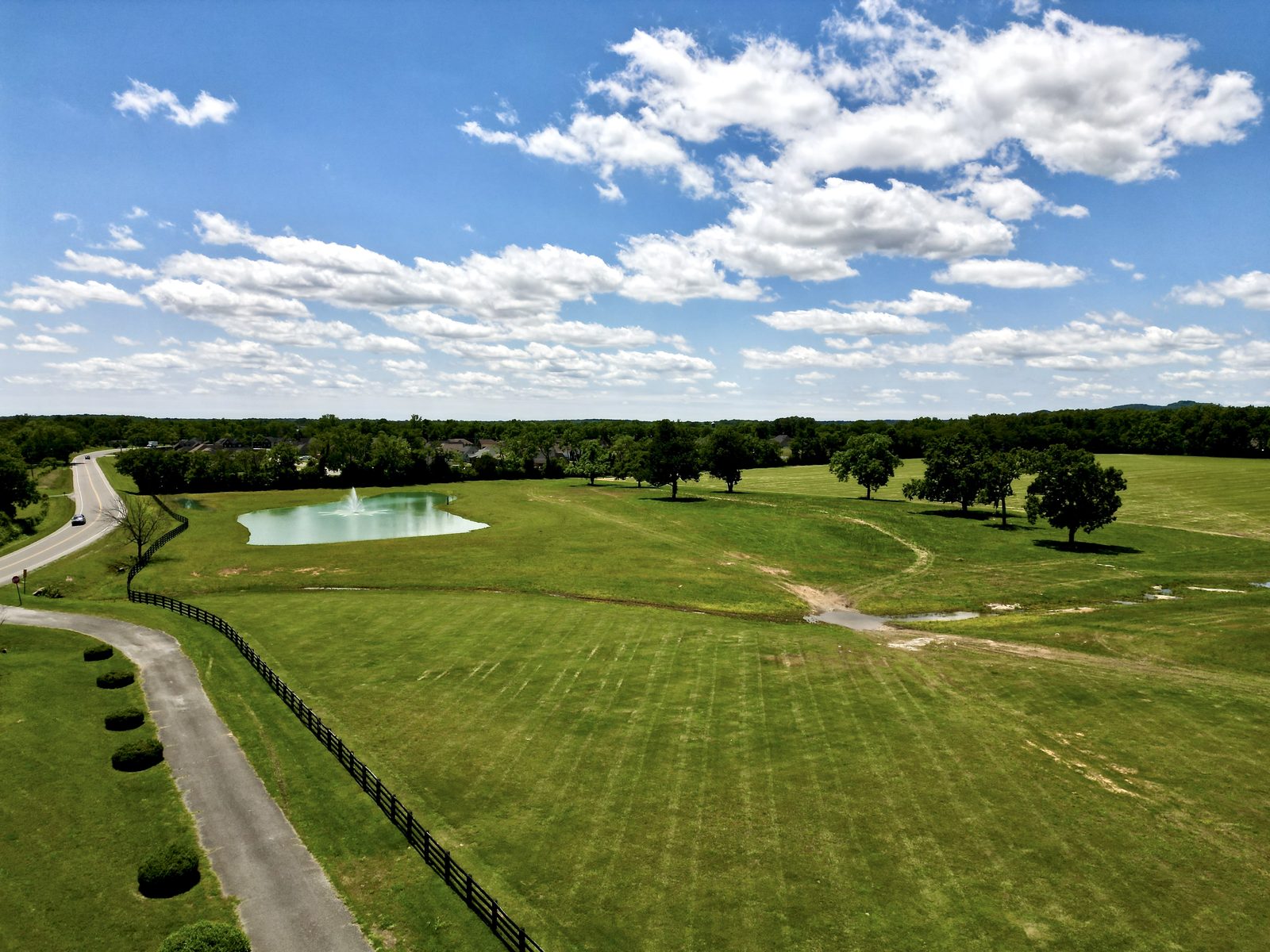 Rolling Tennessee countryside aerial view showing rural land tracts and tree lines